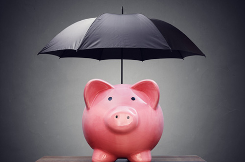 a piggy bank with an umbrella